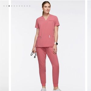 Jaanuu Women's 3-Pocket
Scrub Top - Dusty Rose